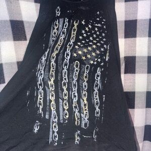 black tank top with open back and gold and white details. social misfits medium.